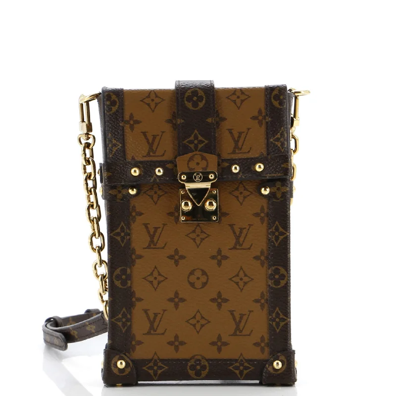 Vertical Trunk Pochette Reverse Monogram Canvas